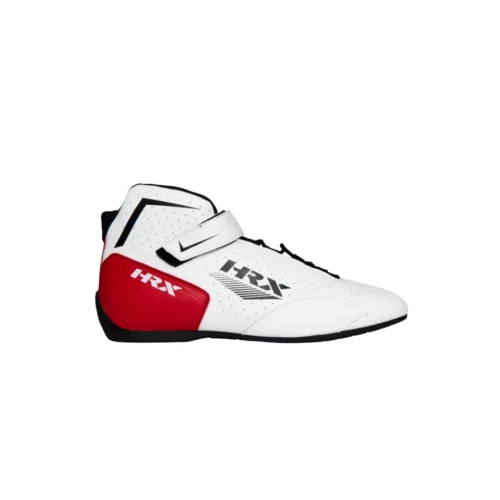 Pair of white mid-top HRX racing shoes featuring a vibrant red heel panel, black trim lines, black laces, and an adjustable ankle safety strap with the HRX logo. Pair of white mid-top HRX racing shoes featuring a vibrant red heel panel, black trim lines, black laces, and an adjustable ankle safety strap with the HRX logo.