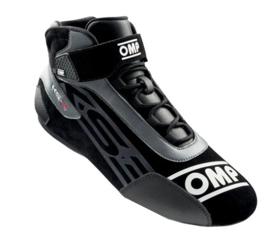 Pair of OMP KS-3 karting shoes in black and grey, featuring mid-top ankle support, durable laces, and high-traction soles for precise pedal control.