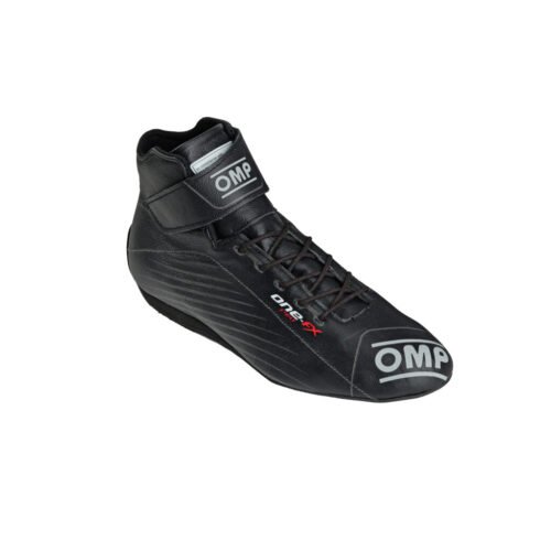 Black OMP One-FX high-top racing shoes with an adjustable ankle strap, lightweight fire-retardant construction, and professional grip sole. Black OMP One-FX high-top racing shoes with an adjustable ankle strap, lightweight fire-retardant construction, and professional grip sole.