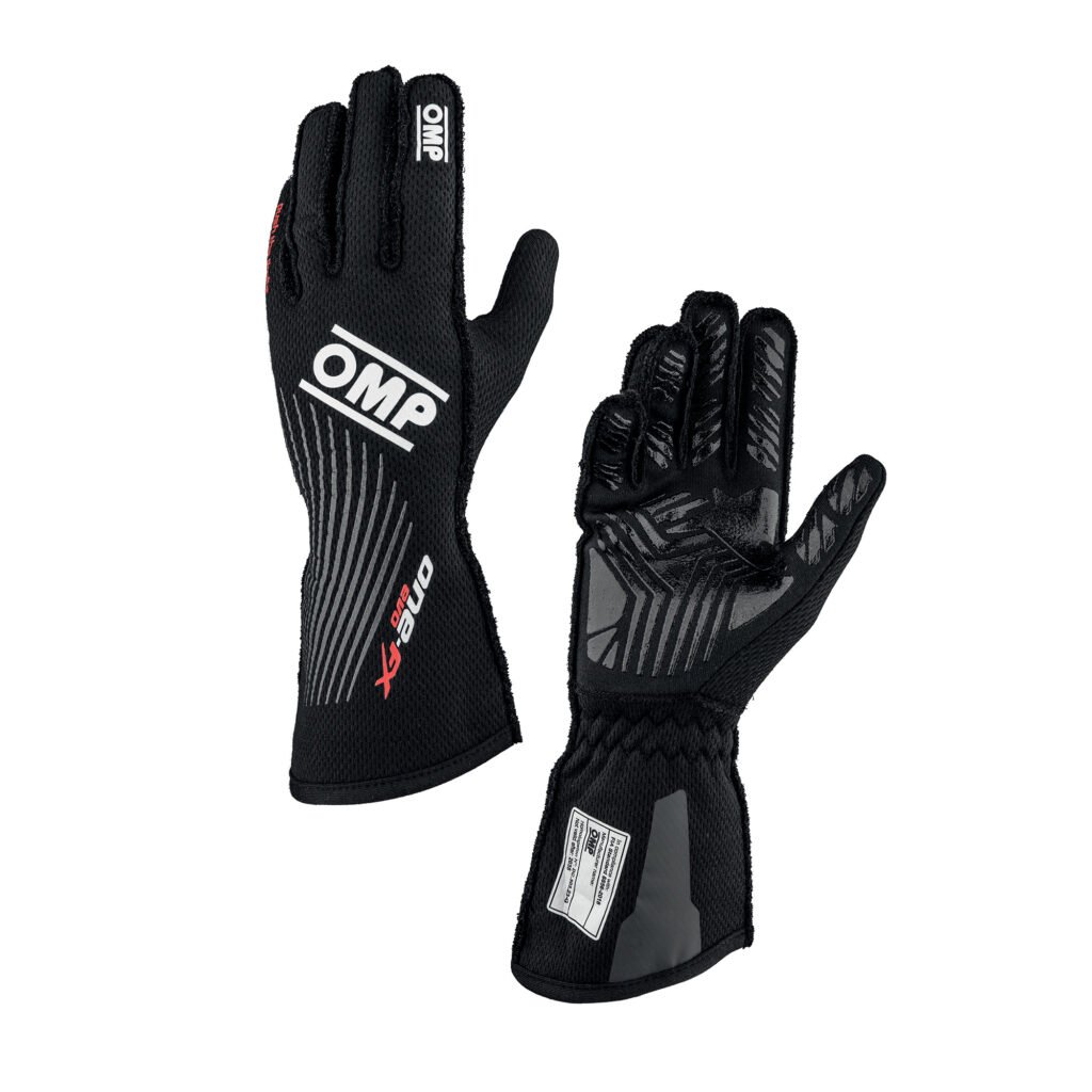 Pair of black OMP One-FX motorsport racing gloves showing high-grip silicone palms and ergonomic protective top padding. Pair of black OMP One-FX motorsport racing gloves showing high-grip silicone palms and ergonomic protective top padding.