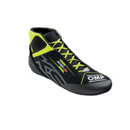 Black and fluorescent yellow OMP KS-3 high-top karting shoes featuring a robust suede leather upper, breathable mesh side panels, and a slip-resistant rubber outsole. Black and fluorescent yellow OMP KS-3 high-top karting shoes featuring a robust suede leather upper, breathable mesh side panels, and a slip-resistant rubber outsole.